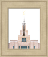 A close up of the Saratoga Springs Utah temple's spire, lightly dusted with snow.