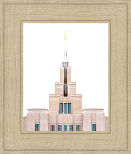 A close up of the Saratoga Springs Utah temple's spire, lightly dusted with snow.