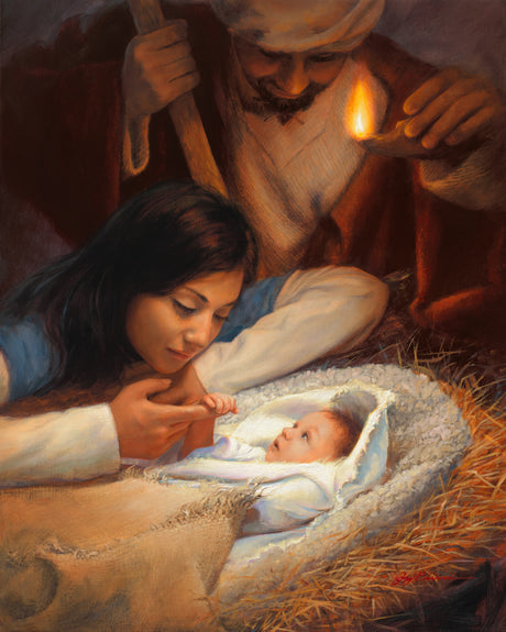 Mary holding baby Jesus' hand with Joseph watching over the manger scene