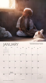 January calendar page featuring a young child gazing out a window with a soft light, accompanied by a resting lamb.