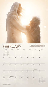 February calendar page with a serene image of a compassionate figure in robes gently holding an elderly woman in warm light.