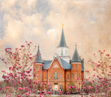 The Provo City Center Utah Temple with pink flowers.