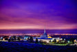 The Billings Montana Temple at twilight with a purple sky.