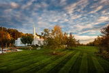 The Palmyra New York Temple with a green field.