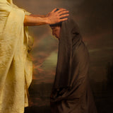 Christ with his hands on a persons head healing them. 