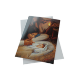 A festive Christmas card depicting a baby in a manger, from the Jay Bryant Ward Boxed Christmas Cards series.
