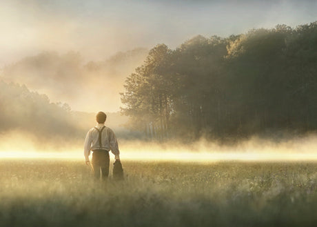 Young Joseph Smith walking towards a grove of trees. art 5